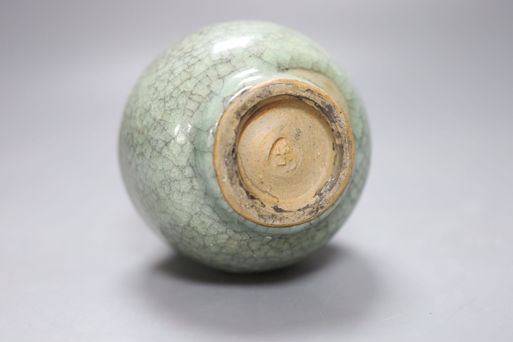 James Walford (1913-2003). A celadon glazed dish, diameter 24cm, and a crackle glazed vase, impressed marks